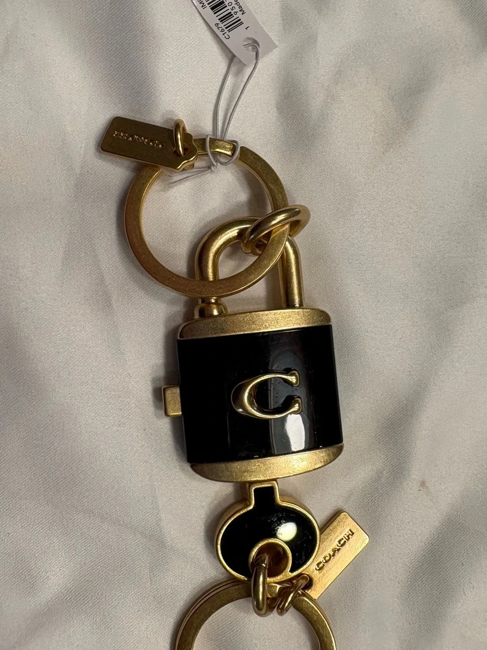 Coach Black and Gold Padlock & Key Keyring Duo